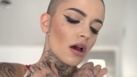 Tattooed skinhead Leigh Raven gets her throat and pussy rammed