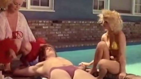 Vintage lesbians Kristara Barrington and Honey Wilder goes wild near the pool