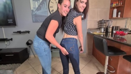 Two dirty brunettes desperately pissing in their own jeans | undressing